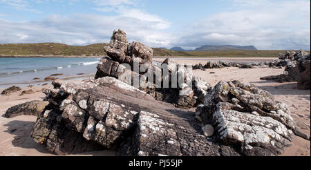 Achnahaird Beach in Wester Ross, Scottish Highlands. Quiet, cresent shaped beach on the north west coast of Scotland, with mountains in the background Stock Photo