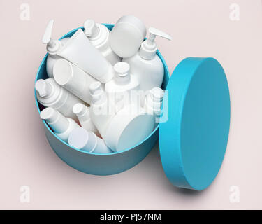 Open large round gift box filled with cosmetics. Variety of different cosmetic products. Close-up, top view Stock Photo