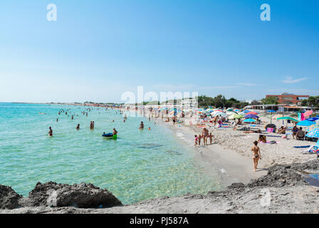 Italian people on a public beach of Lido Marini, Lecce, puglia, Italy Stock Photo