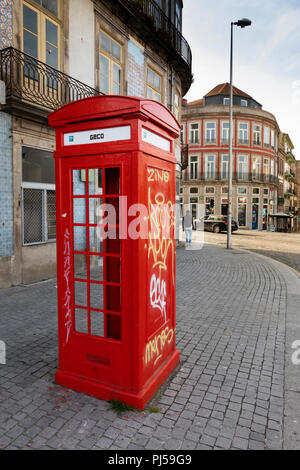 Portugal, Porto, Avenida Dom Afonso Henriques, historic British designed red K3 telephone kiosk Stock Photo