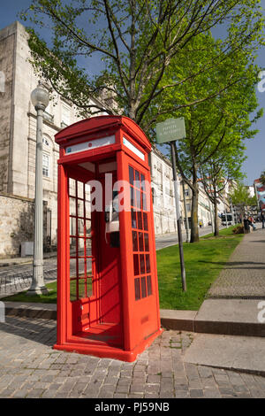 Portugal, Porto, Ribeira, Rua de Ferreira Borges, British designed red K3 telephone kiosk in square Stock Photo