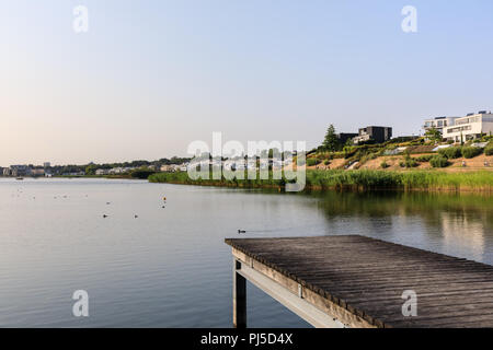 Phoenixsee, a popular urban leisure and recreation lake in Horde, Dortmund, and modern residential architecture,  North Rhine-Westphalia, NRW, Germany Stock Photo