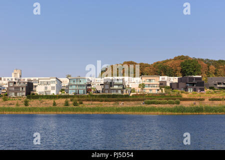 Phoenixsee, a popular urban leisure and recreation lake in Horde, Dortmund, and modern residential architecture,  North Rhine-Westphalia, NRW, Germany Stock Photo