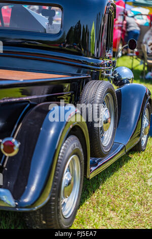Shallow depth of field closeup of the exterior passenger side on a 1932 Ford pickup. Stock Photo