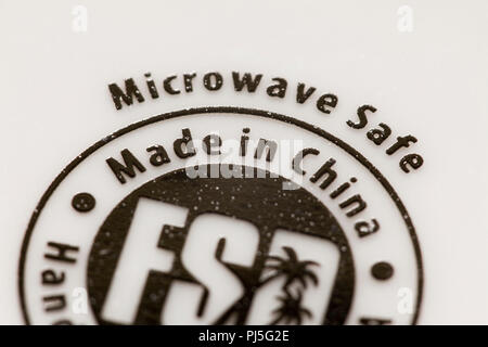 Made in China label on bottom of ceramic cup Stock Photo