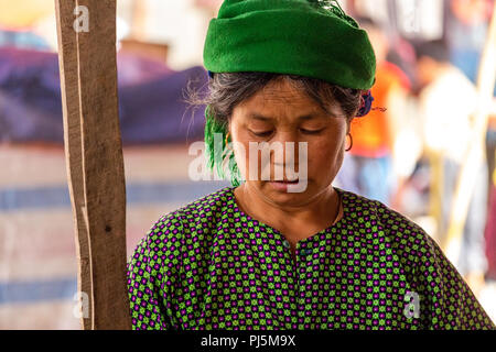 Dong Van, Vietnam - March 18, 2018: Senior woman with stylish clothes at Dong Van sunday market in Vietnam Stock Photo