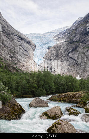 Briksdal glacier with melt water in Jostedalsbreen National Park, Norway Stock Photo