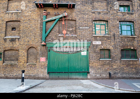 Gates and Hoist on The Whitechapel Bell Foundry Victorian warehouse on Plumbers Row, London Stock Photo