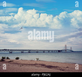 Mackinac suspension bridge at sunset. Opened in 1957, the 26,372-foot-long, Michigan, USA Stock Photo