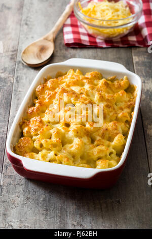 Typical American macaroni and cheese on wooden table Stock Photo