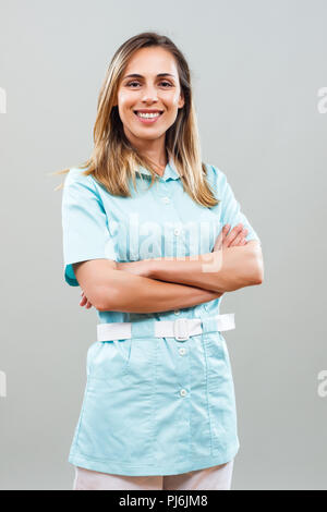 Portrait of beautiful nurse looking at camera. Stock Photo