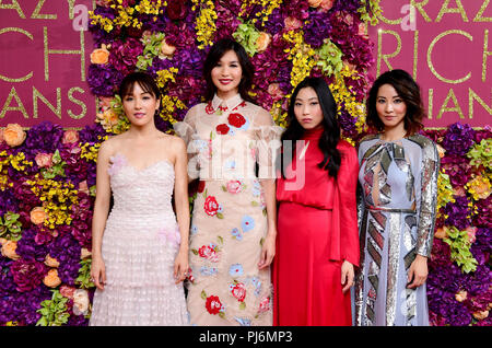 (From left to right) Constance Wu, Gemma Chan, Awkwafina and Jing Lusi attending the Crazy Rich Asians Premiere held at Ham Yard Hotel, London. Stock Photo