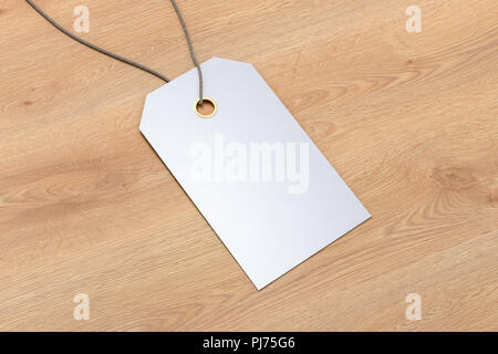 the blank price tag label on wooden background Stock Photo - Alamy