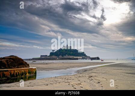 St. Michaels Mount and castle on a stormy summers evening Marazion Penzance Cornwall England UK Stock Photo