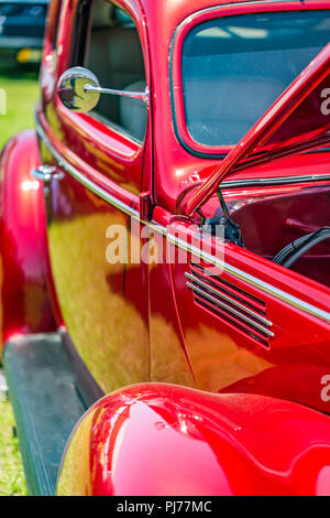 Shallow depth of field closeup of the passenger side details on a 1939 Ford Standard Coupe. Stock Photo