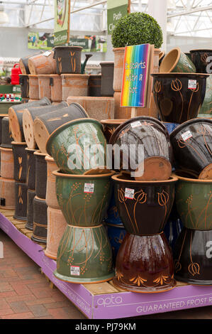 Display of ceramic plant pots on sale at garden centre UK Stock Photo