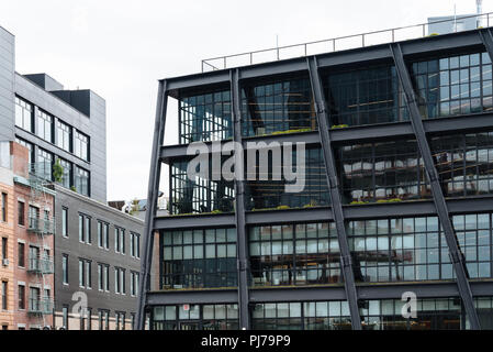 New York City, USA - June 22, 2018:  New office building in Meatpacking district in Chelsea. It is the most fashionable leisure area in town Stock Photo