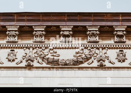 Beautiful decorative bas-relief on a house. Stock Photo