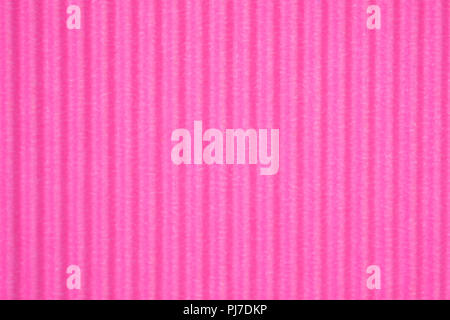 Pink corrugated paper texture, use for background. vivid colour with copy space for add text or object. Stock Photo
