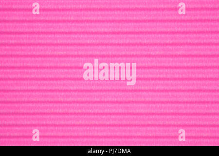 Pink corrugated paper texture, use for background. vivid colour with copy space for add text or object. Stock Photo