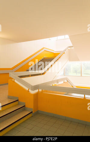 Interior large staircase with yellow bright colors and light Stock Photo