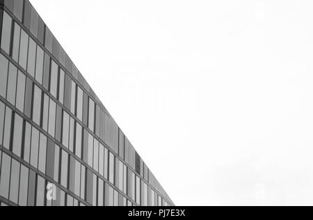 Stunning architectural diagonal shape building with blank space. Black and white Stock Photo