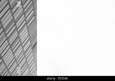 Stunning architectural diagonal shape building with blank space. Black and white Stock Photo
