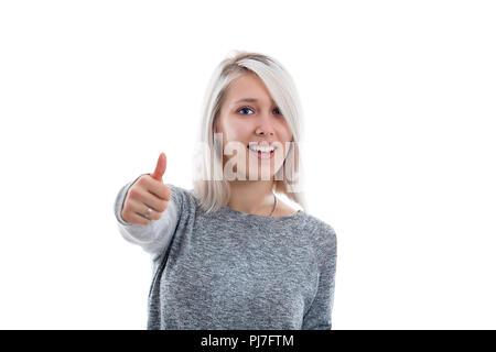 Happy young woman giving thumbs up, like sign isolated on white background. People gesture. Stock Photo