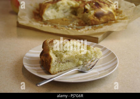 Apple pie on plate with fork. Traditional autumns cake dessert. Stock Photo