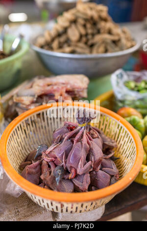 Dead birds chicks meat for sale at burmese market in Myanmar. Stock Photo