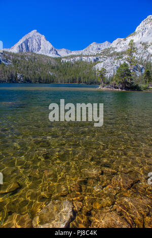 sparkling clear water at 2nd Lake on the Hilton Lakes Trail in the Eastern Sierra Nevada Mountains California USA Stock Photo