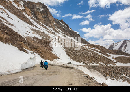 Bikers group at Khardung La pass world highest motorable road in Ladakh, India Stock Photo