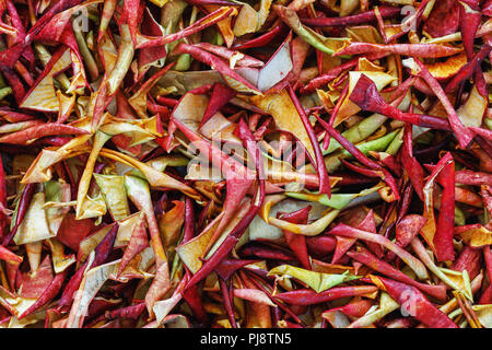 Background of thinly sliced apples in the process of drying, top view Stock Photo