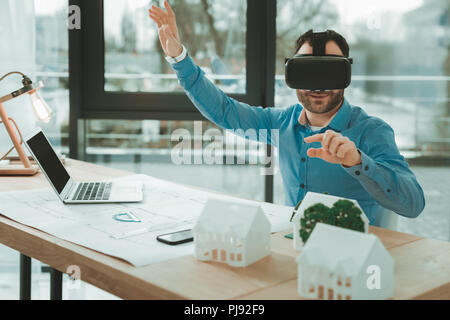 Delighted nice man using 3d glasses Stock Photo
