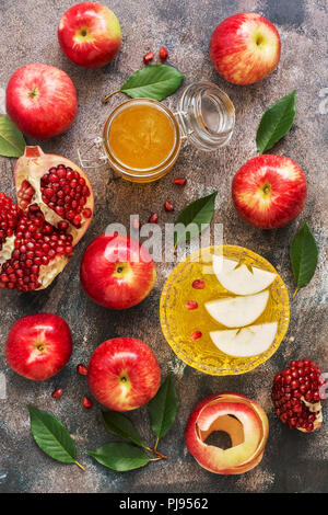 The Jewish New Year. Red apples, pomegranate and honey. Rosh Hashana. Top view, overhead, flat lay