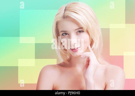 Young girl touching her skin and looking glad Stock Photo