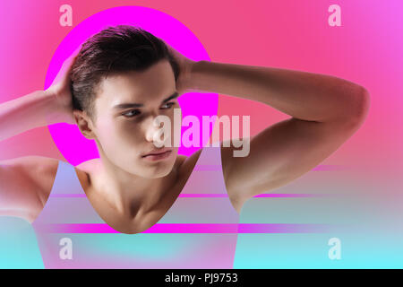 Serious nice handsome man touching his head Stock Photo
