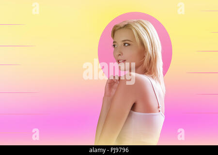 Pleasant delighted nice woman touching her shoulder Stock Photo