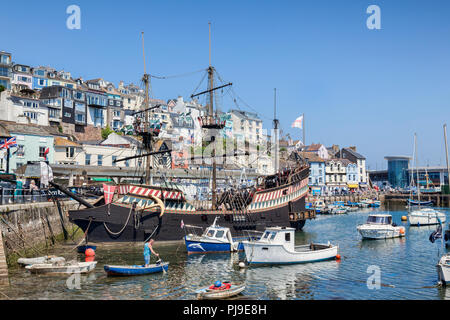 23 May 2018: Brixham, Devon, UK - The Golden Hind replica, an attraction in Brixham Harbour. Stock Photo