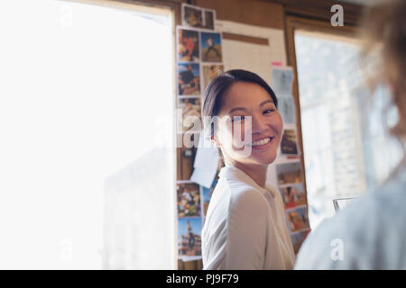 Portrait confident, smiling creative businesswoman Stock Photo