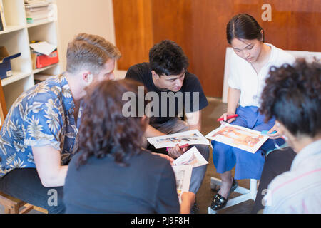 Creative designers reviewing proofs Stock Photo