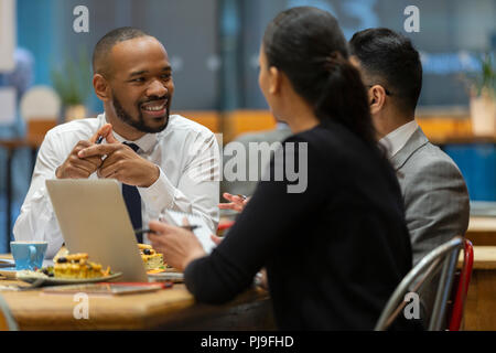Business people meeting, working in cafe Stock Photo