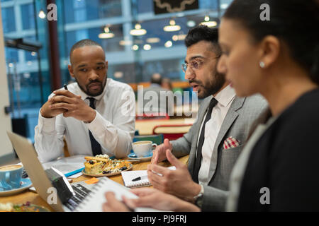 Business people meeting, working in cafe Stock Photo