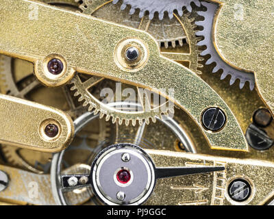 brass mechanism in antique pocket watch close up Stock Photo