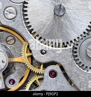 gears of vintage steel mechanical watch close up Stock Photo