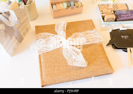 Burlap Wedding Guest Book and Photo Booth Accessories Stock Photo