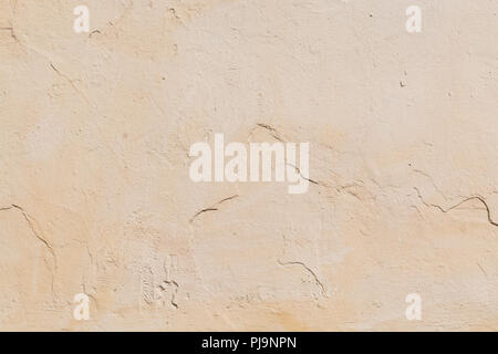 Painted beige concrete wall texture background. Stock Photo