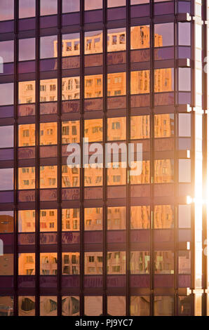 Rotterdam, The Netherlands, August 31, 2018: residential tower De Coopvaert reflecting in office tower Coolse Poort Stock Photo