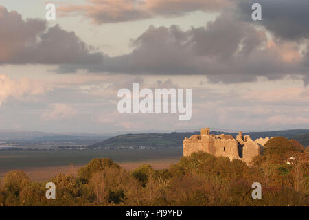 Weobly Castle lit by evening sun on the Gower peninsula, Swansea, south Wales. Stock Photo