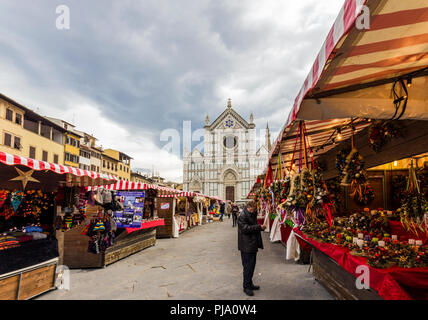 Florence, Italy - December 2013: from the city of Heidelberg in Germany in Piazza Santa Croce in Florence: 'Weihnachtsmarkt', the typical German Chris Stock Photo